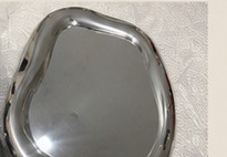 Mirror surface being hand-polished to a shine